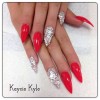 Modele de unghii roșii cu diamante